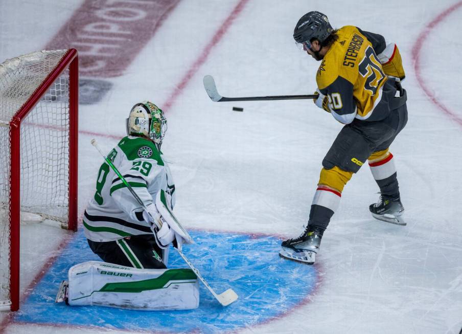 Golden Knights center Chandler Stephenson (20) nearly scores on Dallas Stars goaltender Jake Oe ...