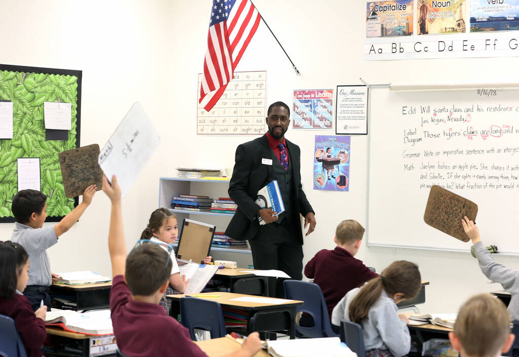 Manuel Mathis, a second-grade teacher at Challenger School-Silverado campus, teaches math on Fr ...