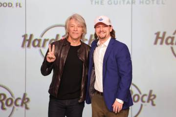Jon Bon Jovi, left, and son Jesse Bongiovi attend an event at Seminole Hard Rock Hotel & Ca ...