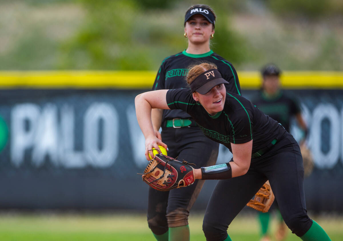 Palo Verde infielder Mya Bartlett (18) tosses a ball to first base against a Coronado runner du ...