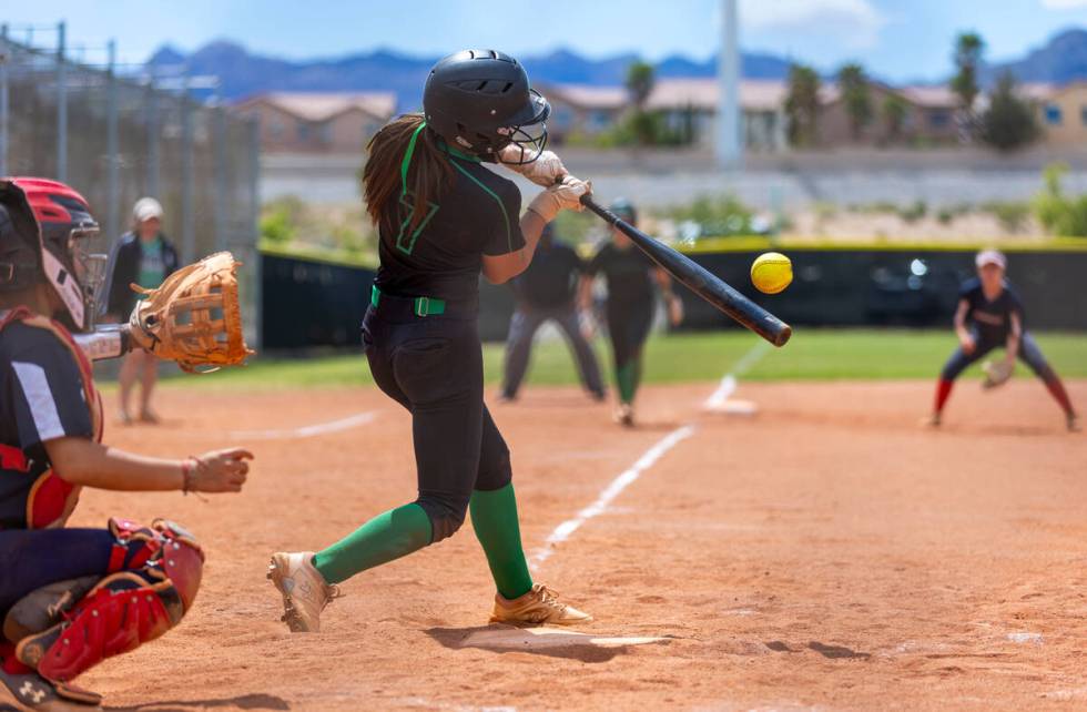 Palo Verde batter Alexis Kearnes (7) connects on a pitch against the Coronado pitcher during th ...