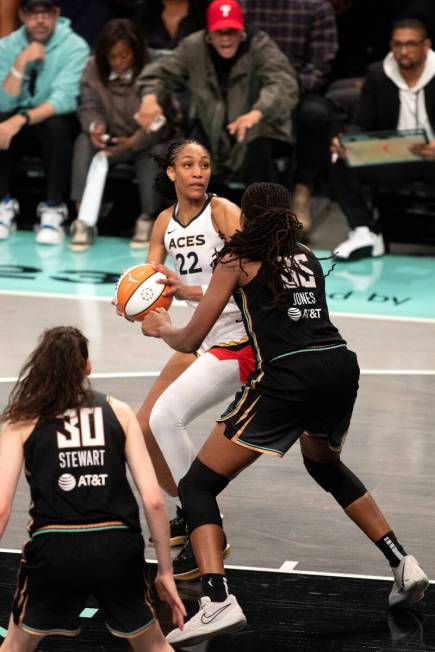 Las Vegas Aces forward A'ja Wilson (22) prepares to shoot against New York Liberty forward Jonq ...