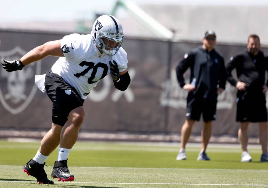 Raiders rookie guard Jackson Powers-Johnson (70) runs a drill during rookies first day of pract ...