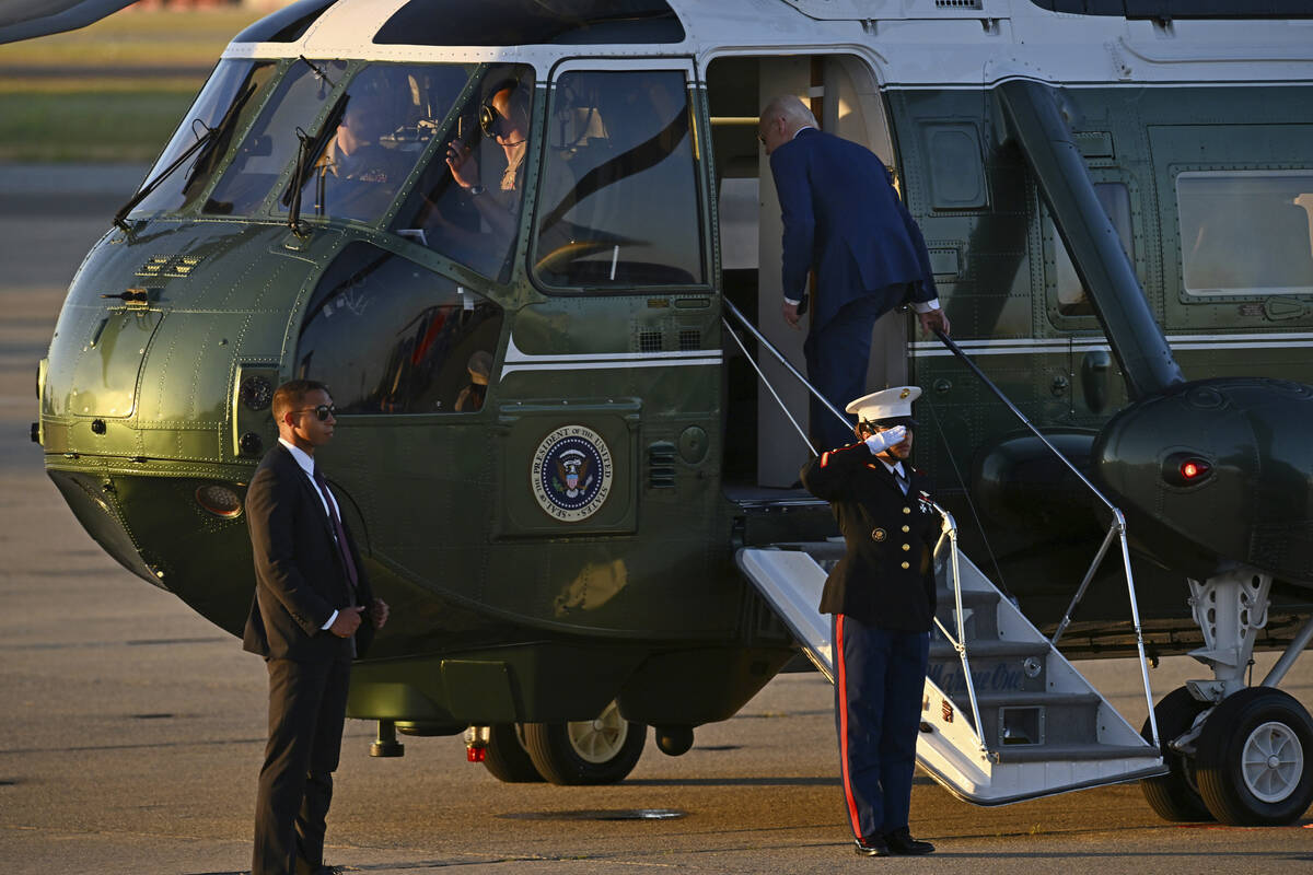 U.S. President Joe Biden boards Marine One at Moffett Airfield in Mountain View, Calif., Thursd ...