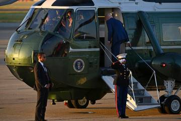 U.S. President Joe Biden boards Marine One at Moffett Airfield in Mountain View, Calif., Thursd ...