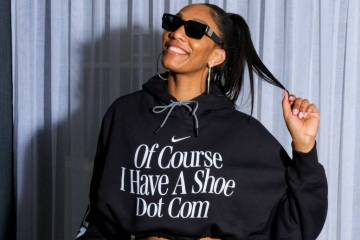Aces forward A'ja Wilson wears a sweatshirt confirming her signature shoe deal with Nike. (Nike)