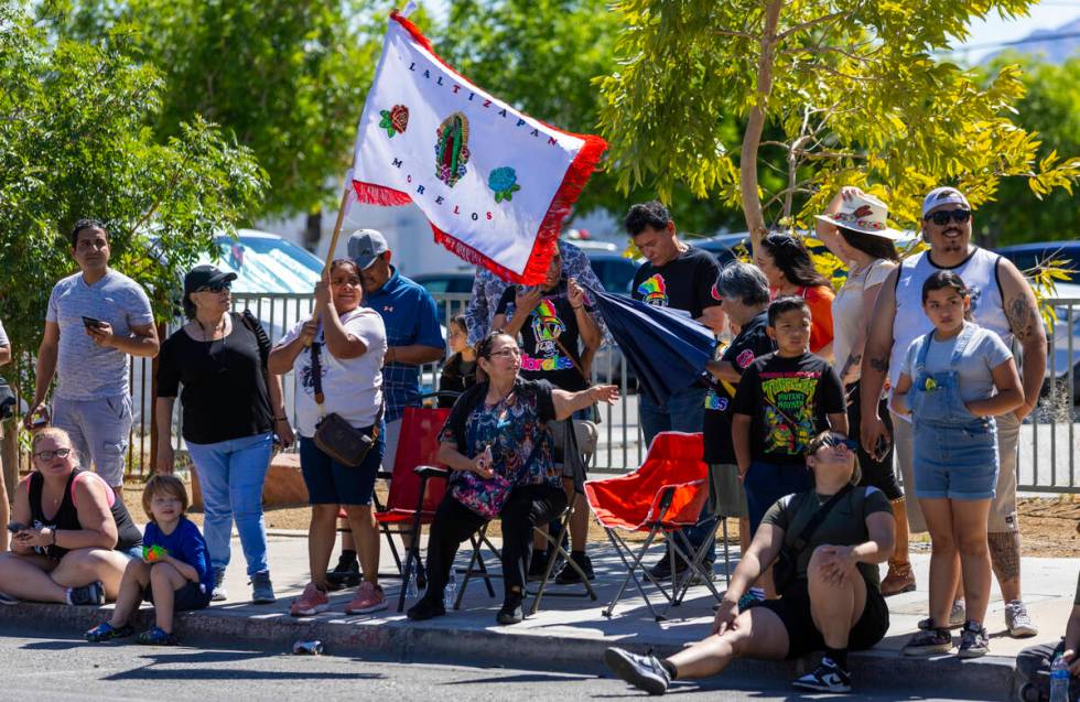 Families watch the festivities along the route during the Helldorado Parade moving up 4th Stree ...