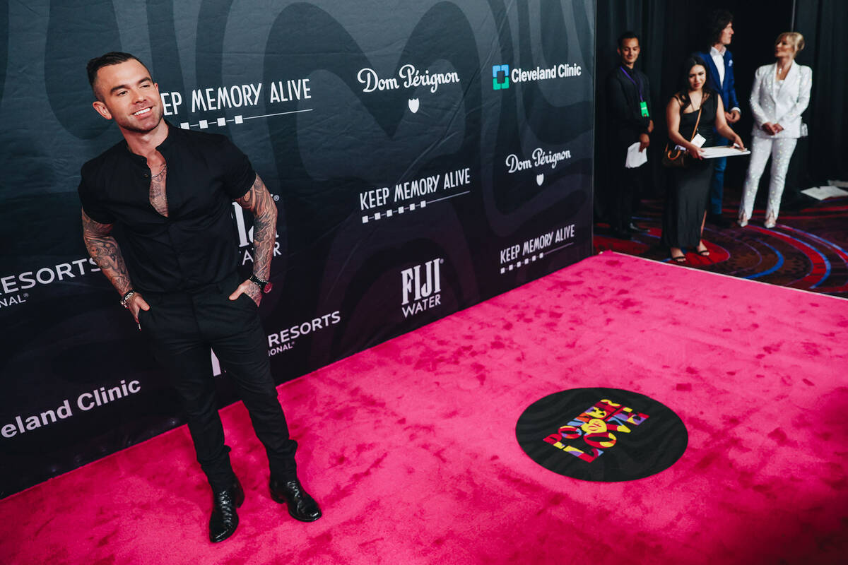 Singer Jay Allen poses for photographs on the red carpet at the 27th annual Power of Love gala ...