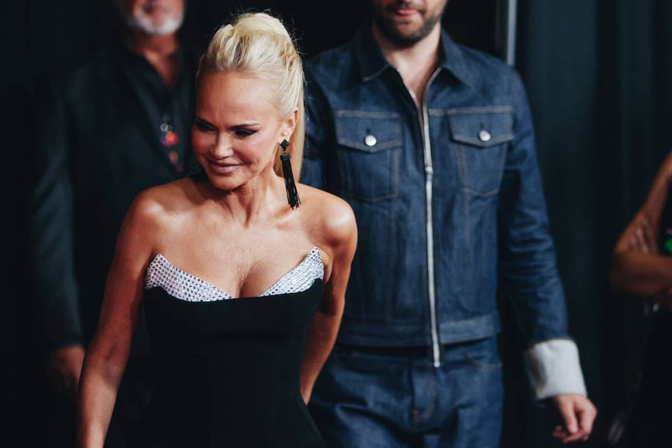 Actress and singer Kristin Chenoweth poses for photographs on the red carpet at the 27th annual ...