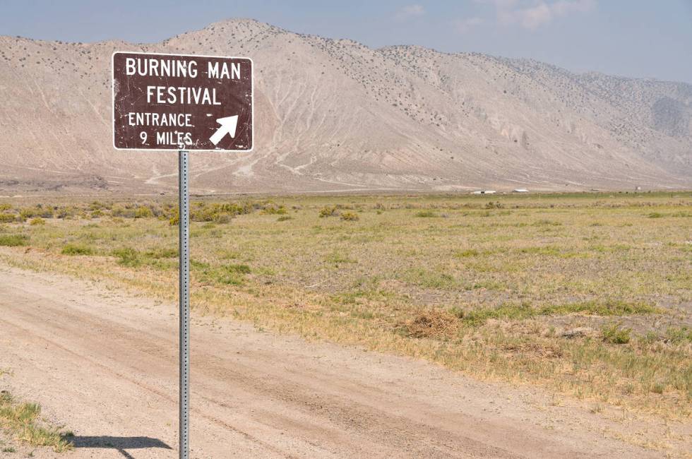 Road signage points the way to the Burning Man festival in the Black Rock Desert in Gerlach, Ne ...