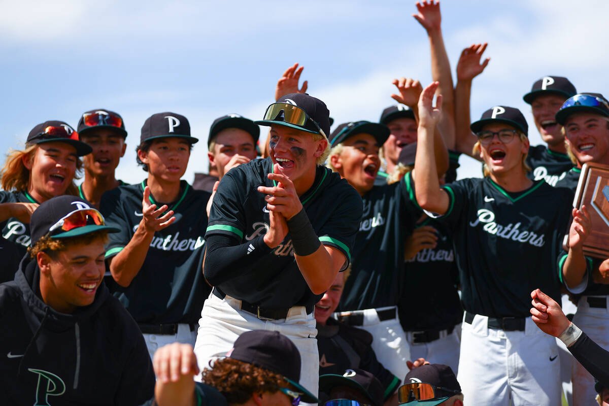 Palo Verde celebrates with their plaque after winning a Class 5A high school baseball Southern ...