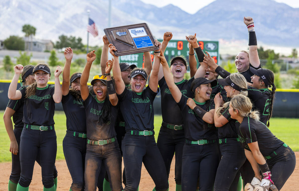 Palo Verde teammates celebrate receiving the winning plaque after defeating Coronado in their 5 ...