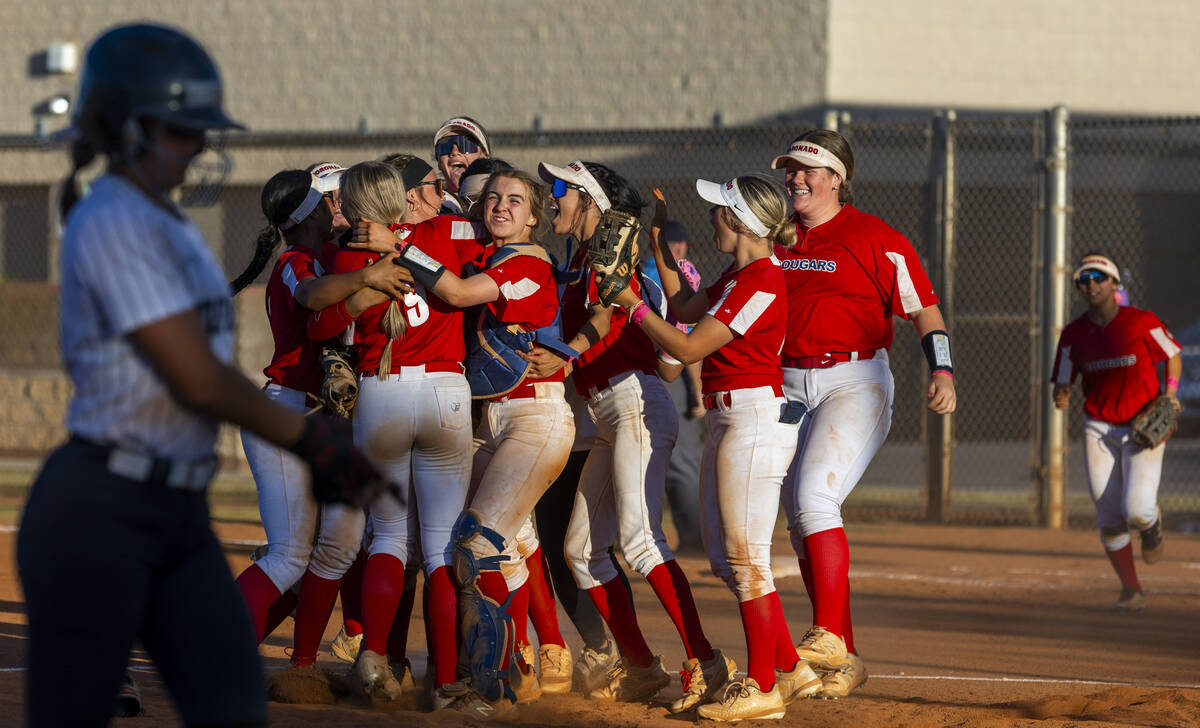 Coronado players celebrate their 4-2 win over Shadow Ridge following the seventh inning of thei ...