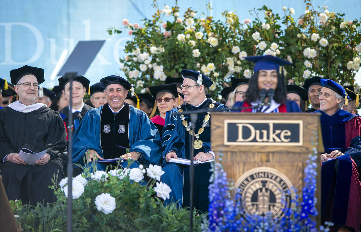 This photo provided by Duke University shows commencement speaker Jerry Seinfeld, front row sec ...