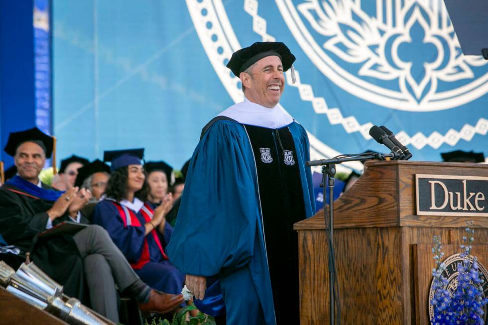 In this photo provided by Duke University, commencement speaker Jerry Seinfeld laughs on stage ...