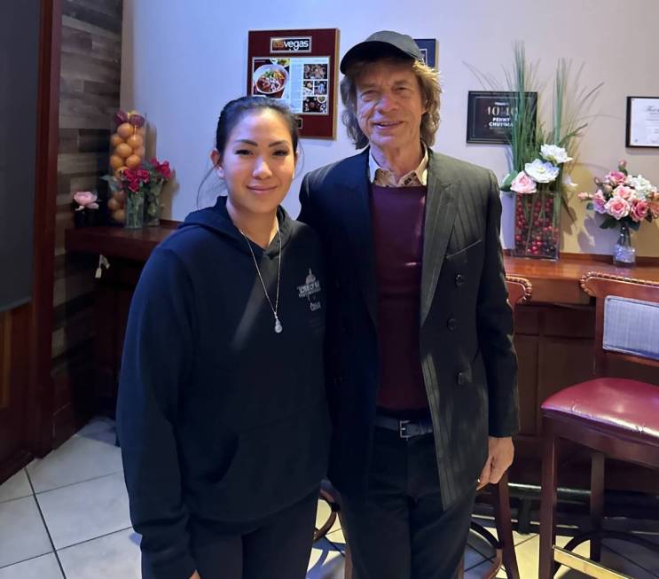 Lotus of Siam co-owner Penny Chutina is shown with rock legend Mick Jagger at the popular Vegas ...