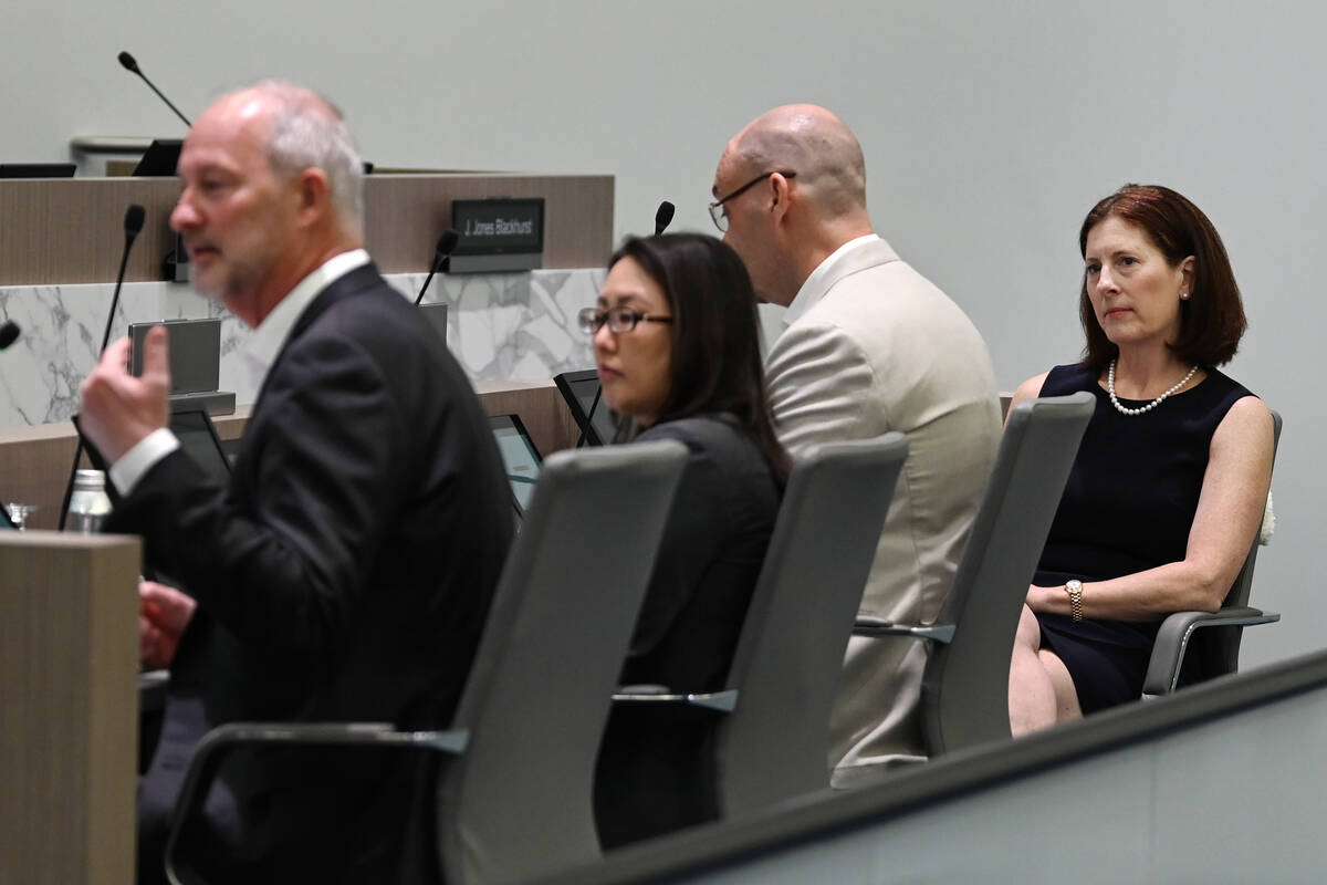 LVCVA Senior Vice President of Communications Lori Nelson-Kraft, right, listens as LVCVA CEO an ...