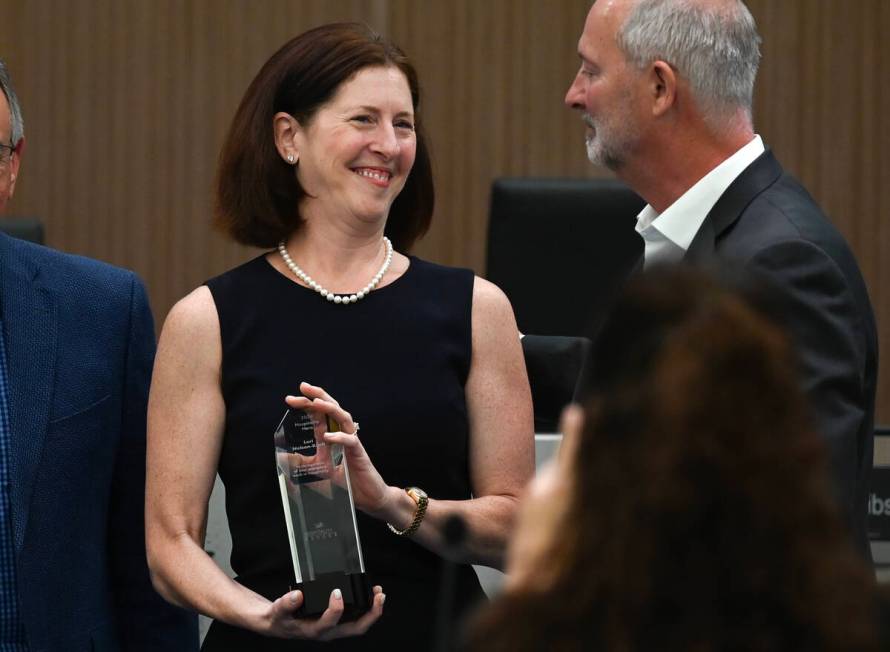 LVCVA Senior Vice President of Communications Lori Nelson-Kraft smiles after being honored with ...