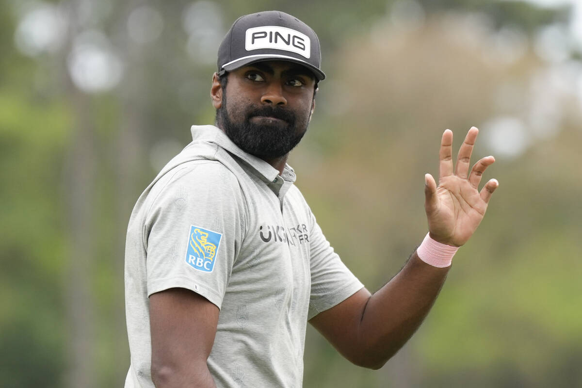Sahith Theegala waves after making a putt on the ninth hole during the final round of the RBC H ...