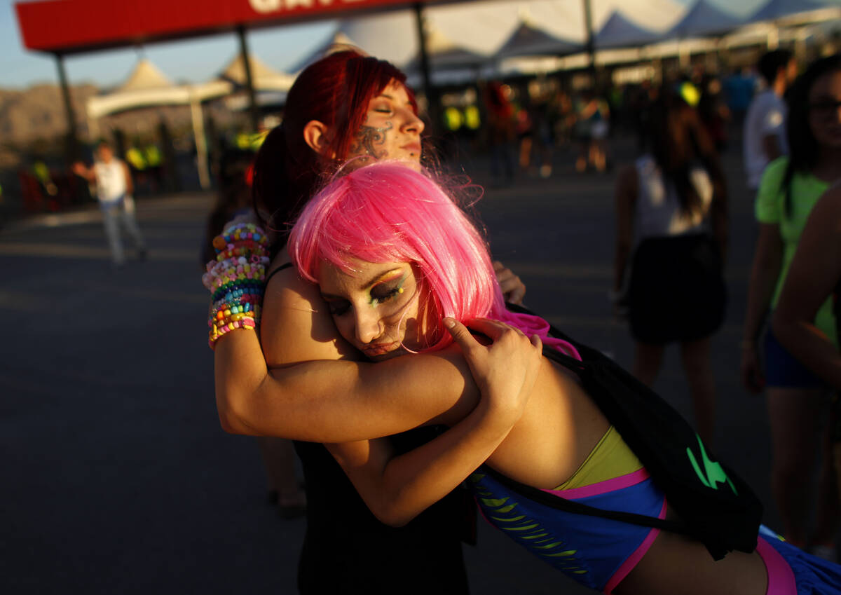 Justine Marsing, right, embraces Andrea Martinez at the Electric Daisy Carnival at the Las Vega ...