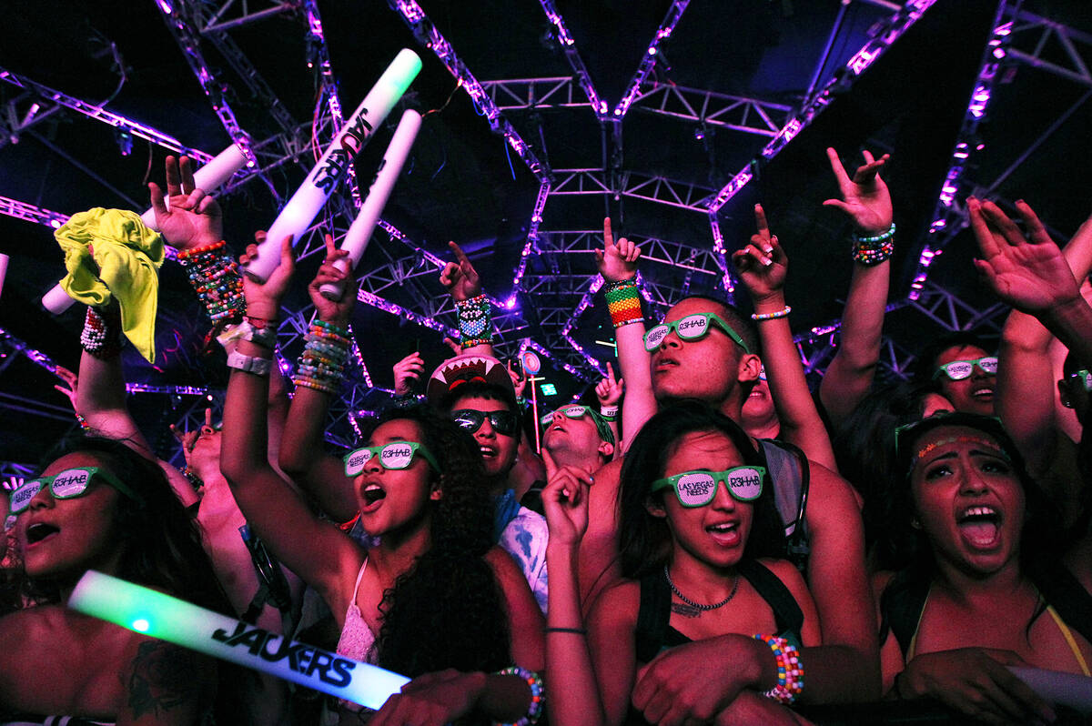 Festival goers dance during Insomniac's Electric Daisy Carnival at the Las Vegas Motor Speedway ...