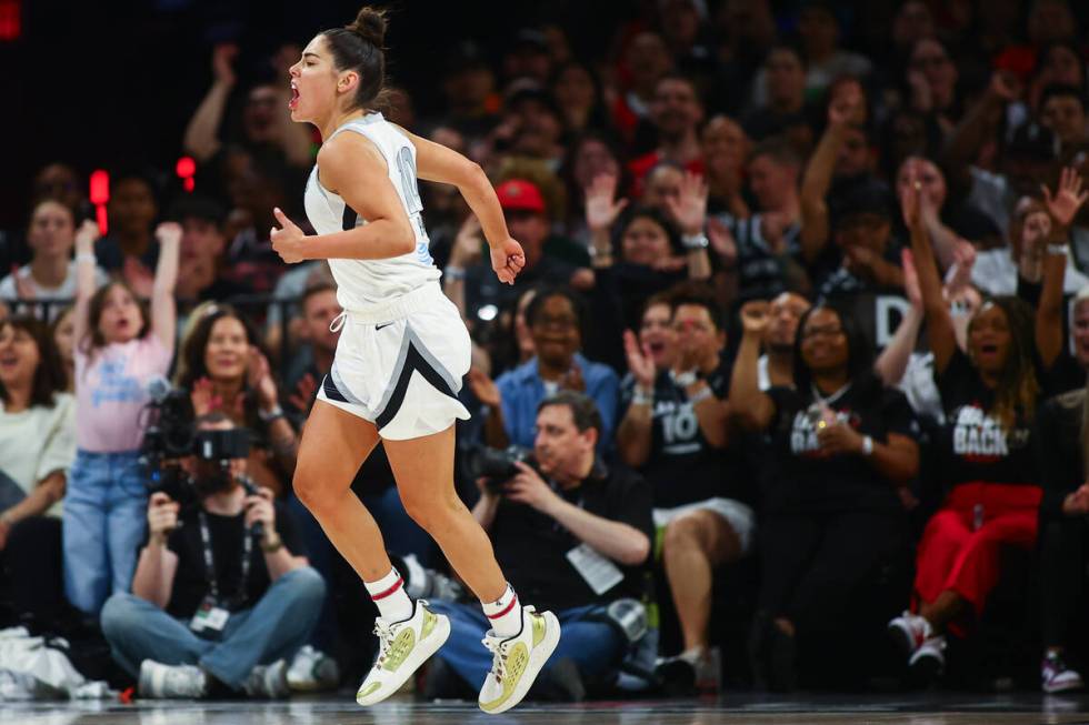 Las Vegas Aces guard Kelsey Plum (10) celebrates after scoring during the first half of a WNBA ...