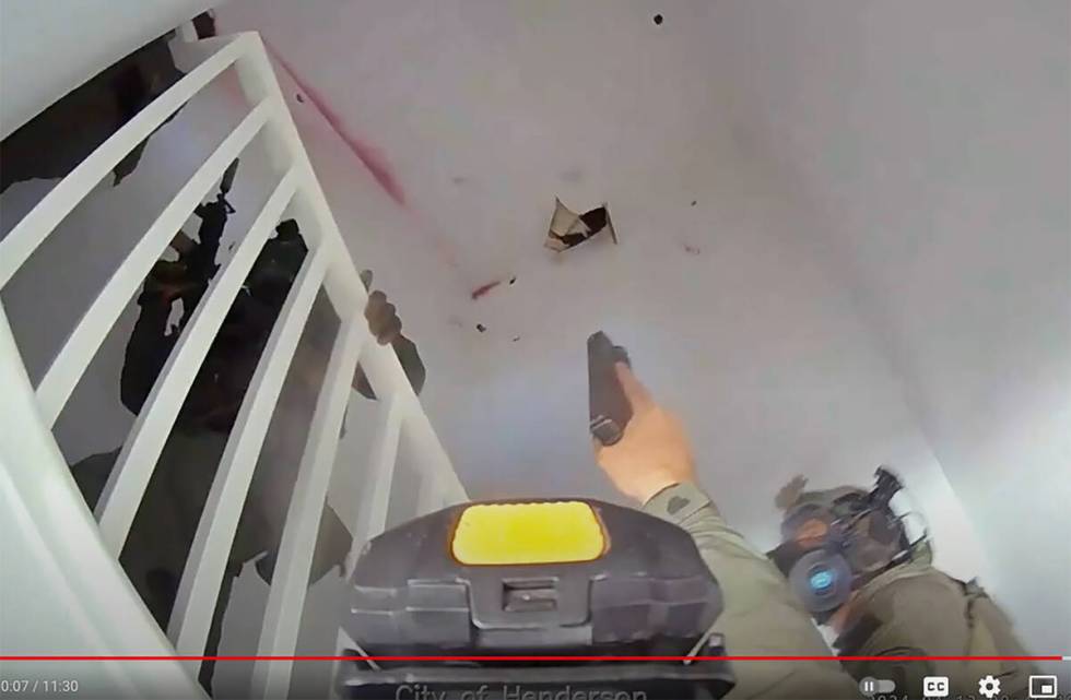 Video from a body-worn police camera shows Henderson police officers inside a townhome on April ...