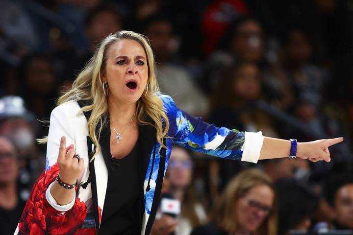 Las Vegas Aces head coach Becky Hammon shouts from the sideline during the first half of a WNBA ...