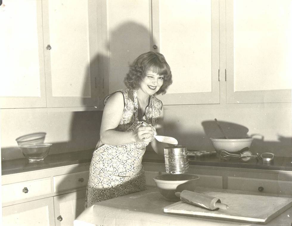 Clara Bow baking in the kitchen of Walking Box Ranch from UNLV Special Collections’ “Walkin ...