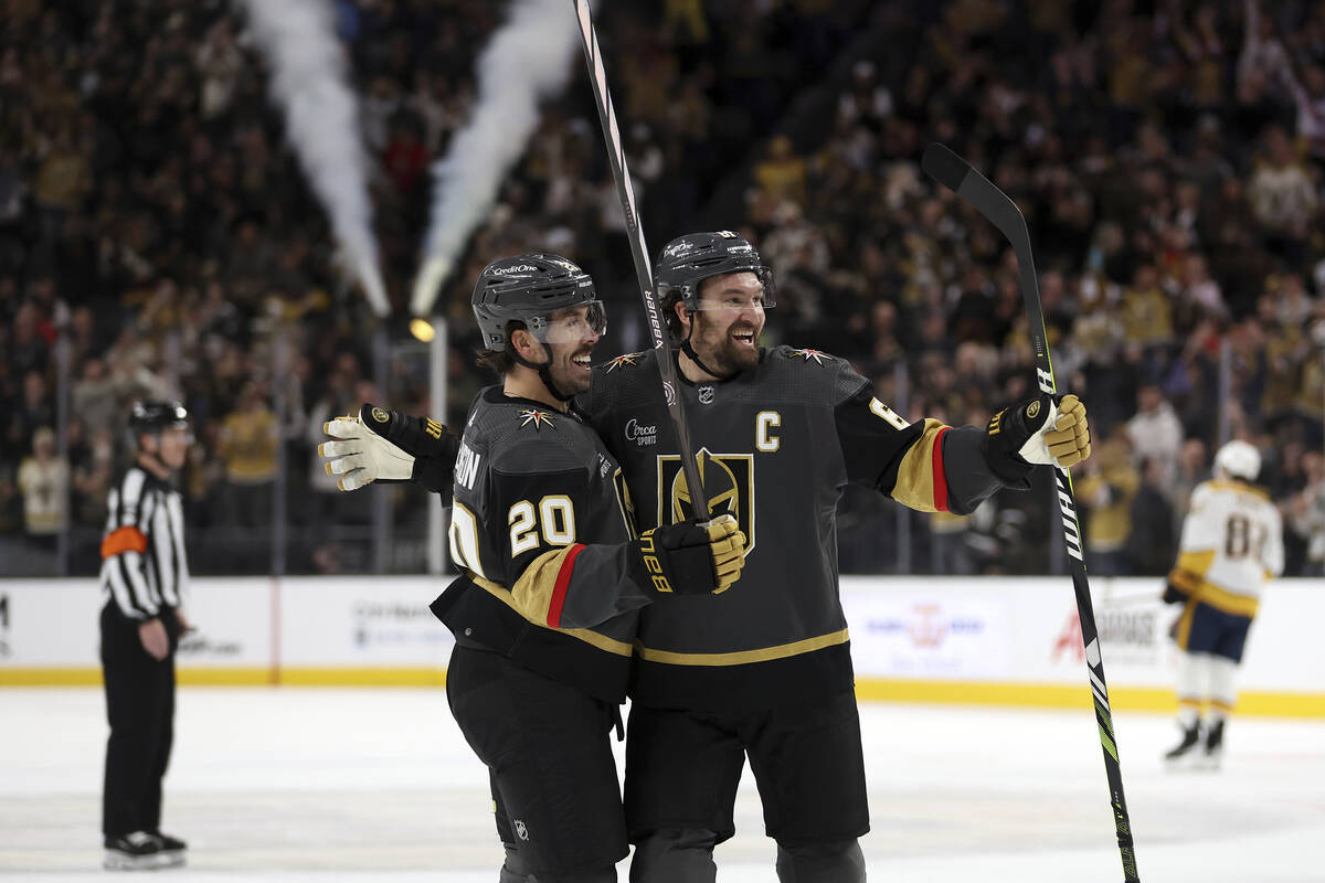 Vegas Golden Knights center Chandler Stephenson (20) and right wing Mark Stone (61) celebrate a ...
