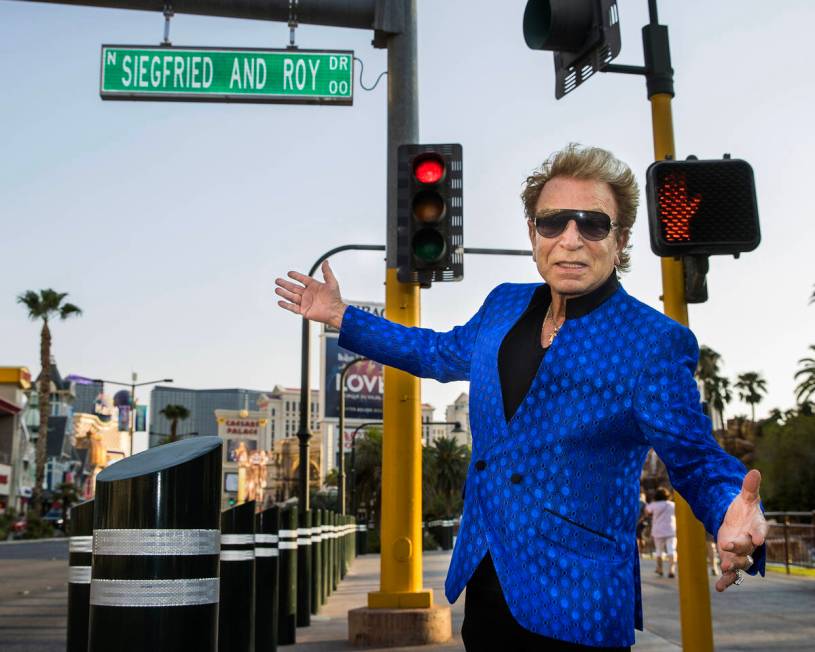 Siegfried Fischbacher poses along the Strip as the Mirage porte cochere is renamed Siegfried & ...