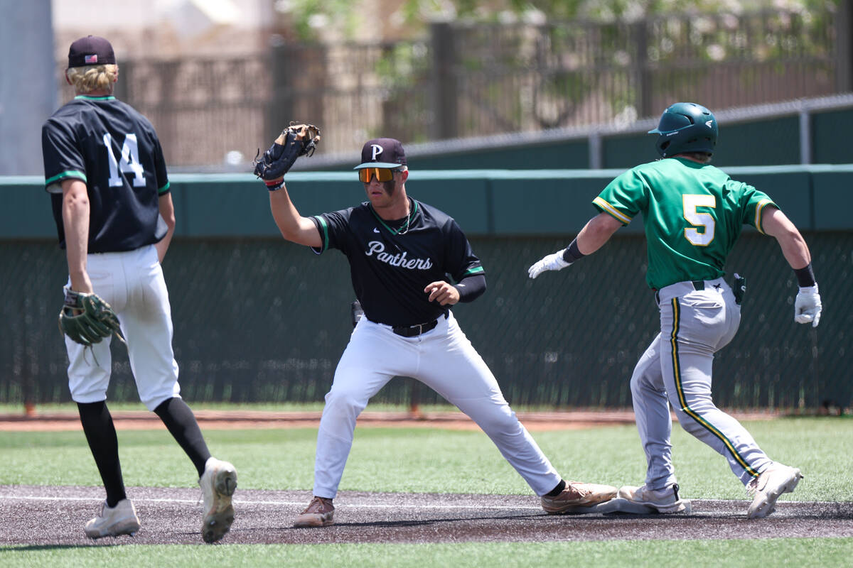 Palo Verde first baseman Tanner Johns gets an out on Bishop Manogue outfielder Rylan Martyka (5 ...