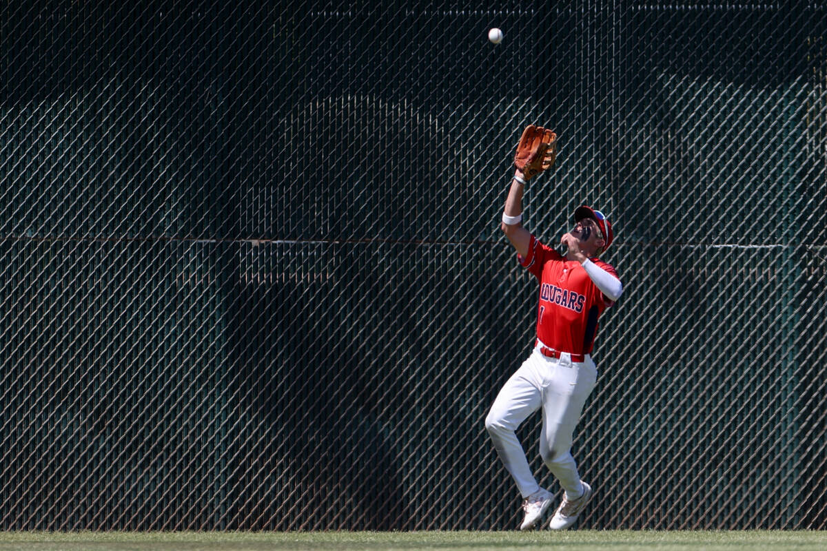 Coronado outfielder Evan Festa (1) catches for an out on Reno during a Class 5A baseball state ...