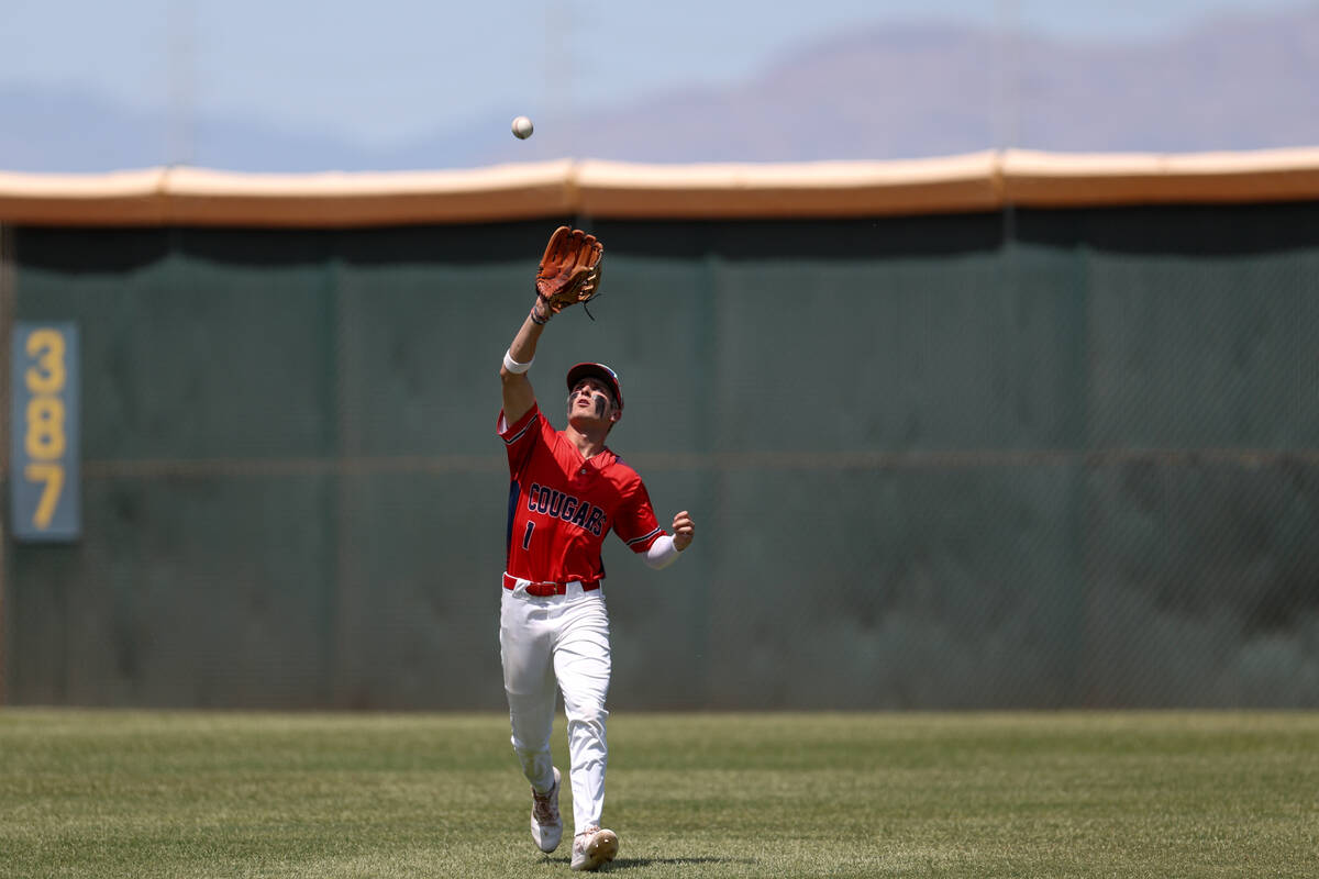 Coronado pitcher Evan Festa (1) catches for an out on Reno during a Class 5A baseball state tou ...