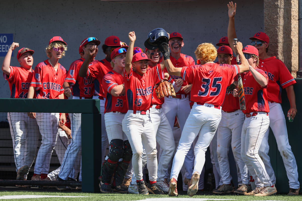 Coronado cheers for their Sean Cole (35) after he scored during a Class 5A baseball state tourn ...