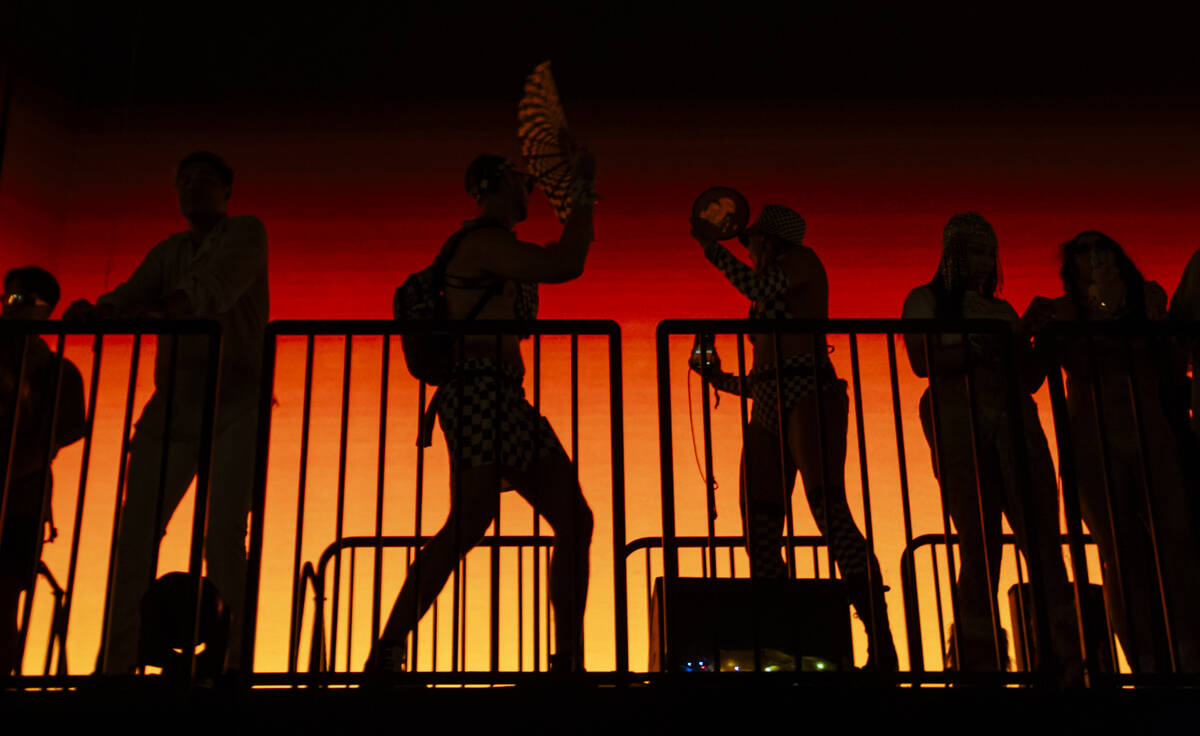 Festival attendees dance as Four Tet performs during the second night of the Electric Daisy Car ...