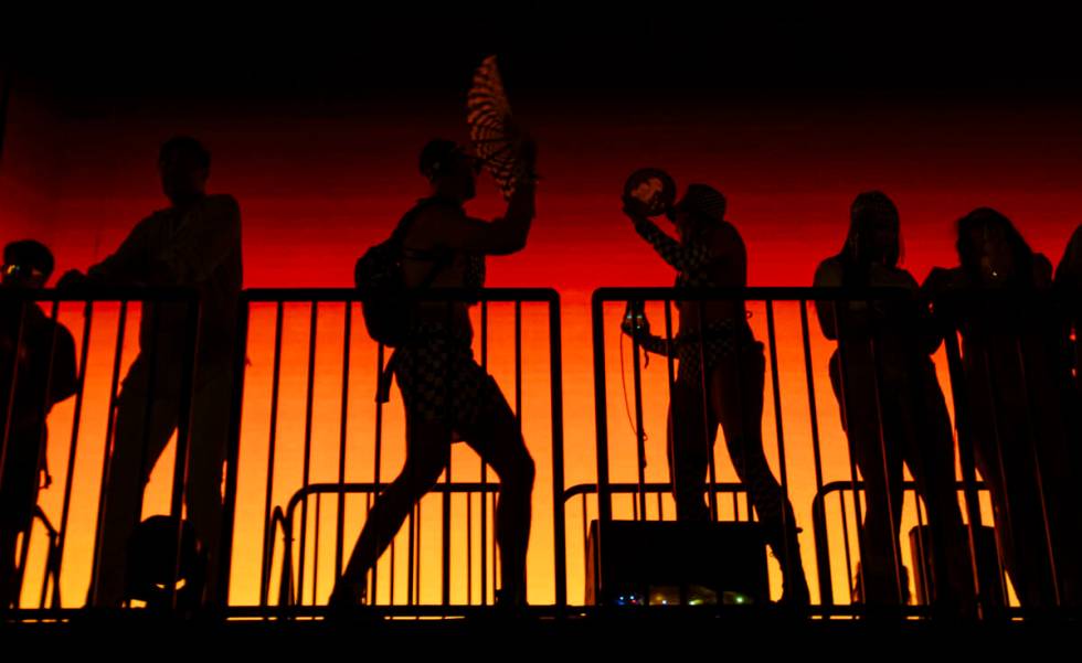 Festival attendees dance as Four Tet performs during the second night of the Electric Daisy Car ...