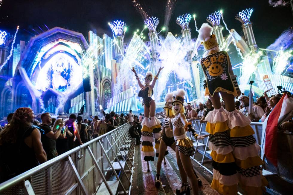 Costumed performers entertain the crowd at Kinetic Field during the second night of the Electri ...