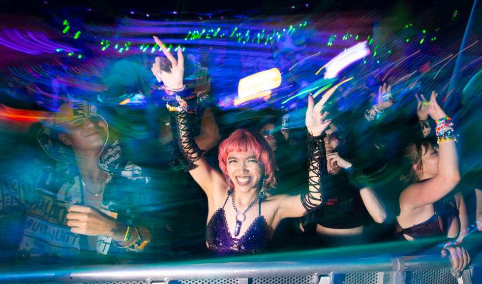 Attendees dance at the Cosmic Meadow stage during the second night of the Electric Daisy Carniv ...