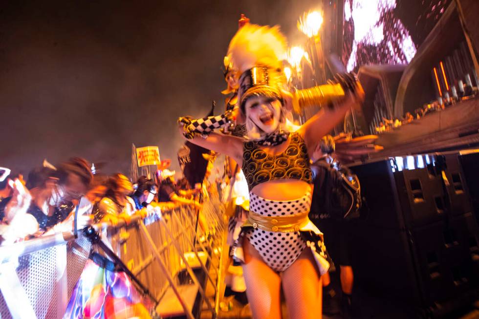 Costumed performers entertain the crowd at Kinetic Field during the second night of the Electri ...