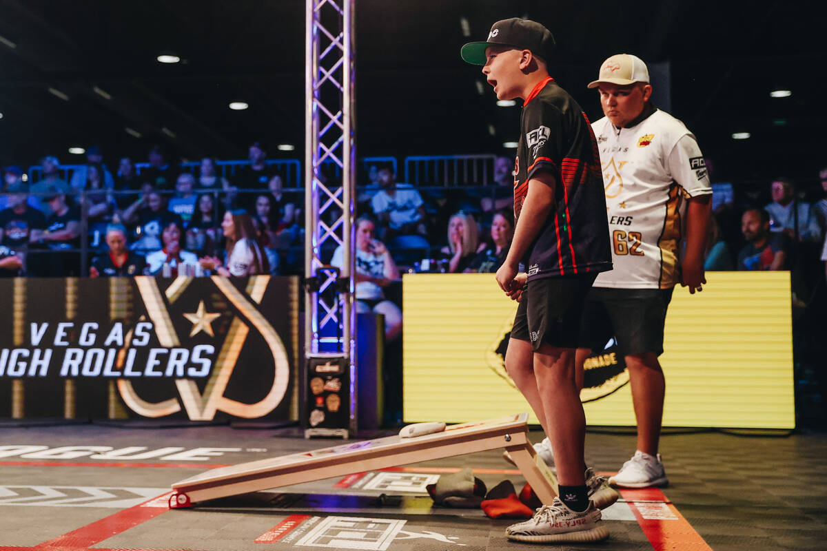 The Texas Bully Baggers’ Brayden Wilson cheers during a professional cornhole matchup ag ...