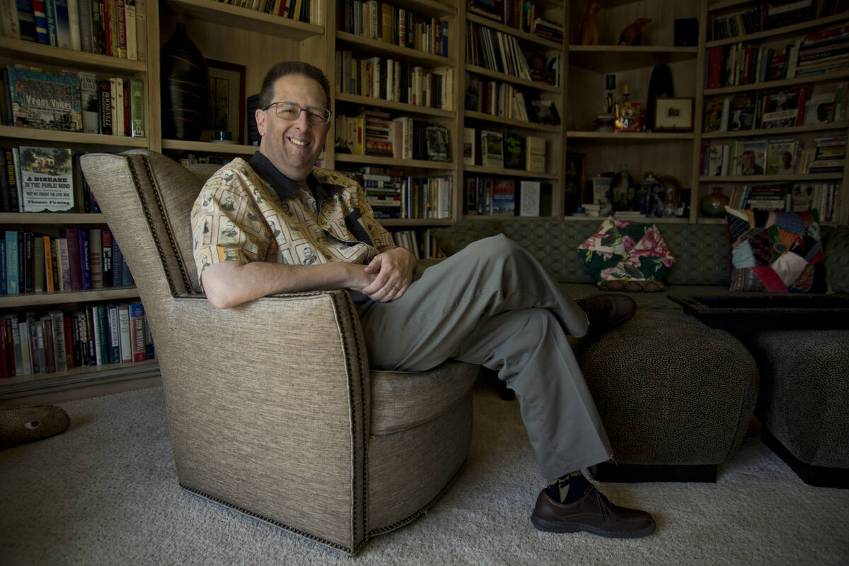 UNLV history professor Michael Green poses for a photograph inside his home near Tropicana Aven ...