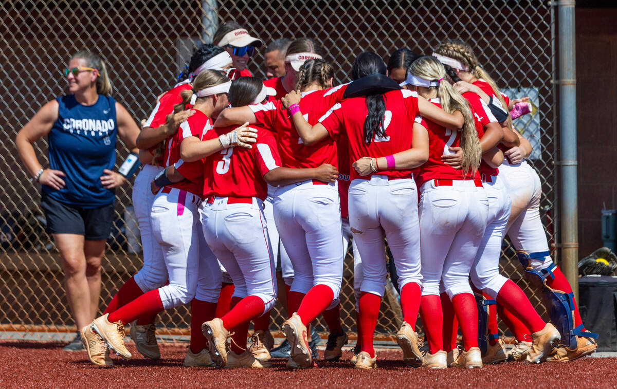Coronado players get pumped up to face Palo Verde during the their 5A softball state tournament ...