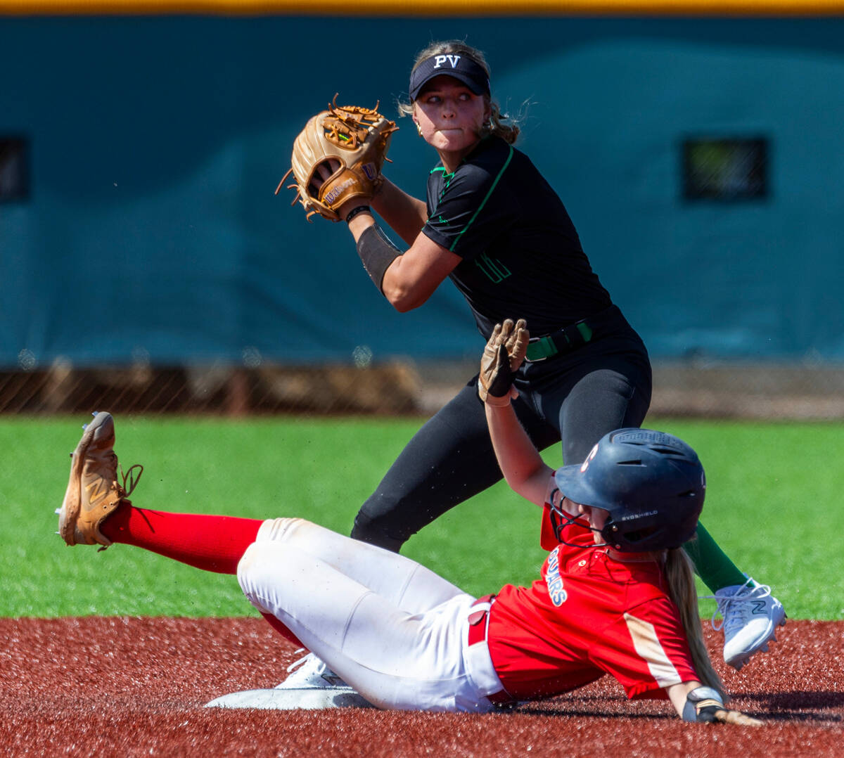 Palo Verde infielder Taylor Johns (11) looks to throw after tagging second base as Coronado ru ...