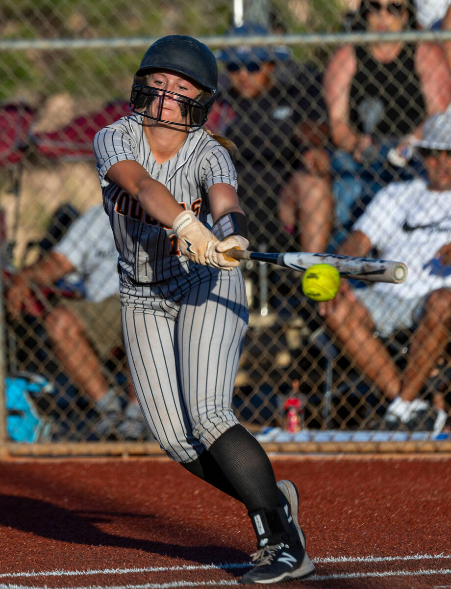 Douglas batter Marissa McLelland (1) connects on a palo Verde pitch during the fifth inning of ...
