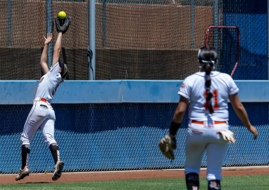 Douglas outfielder Ava Delaney (5) extends for a great catch against Coronado during the first ...