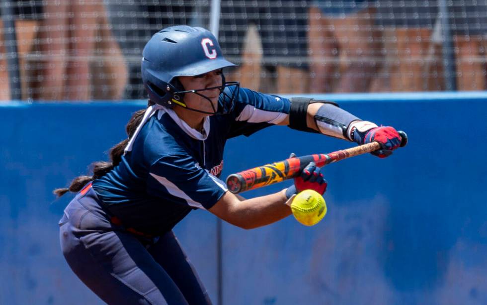 Coronado batter Sarah Lopez (5) bunts a Douglas pitch during the sixth inning of their 5A softb ...