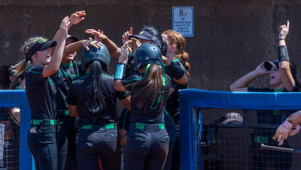 Palo Verde runner Kayleen Enriquez (6) is celebrated for scoring by teammates against Spanish S ...