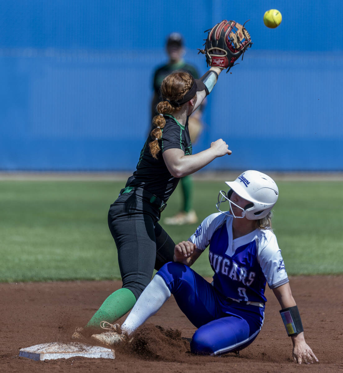 Spanish Springs runner Brooke Baxter (9) arrives at second base safely before a throw to Palo V ...