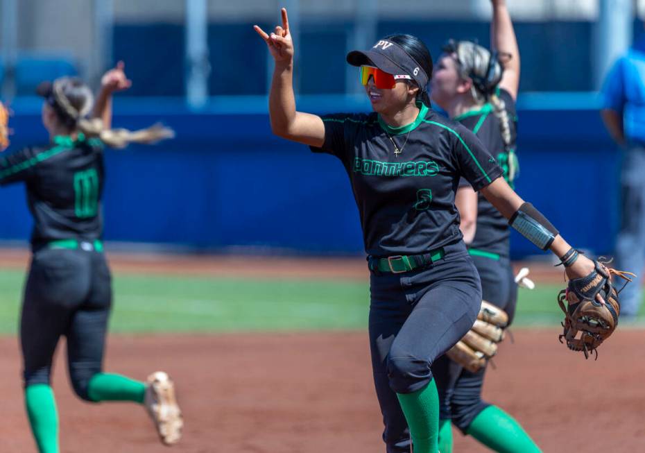 Palo Verde infielder Kayleen Enriquez (6) signals to her outfielder against Spanish Springs dur ...